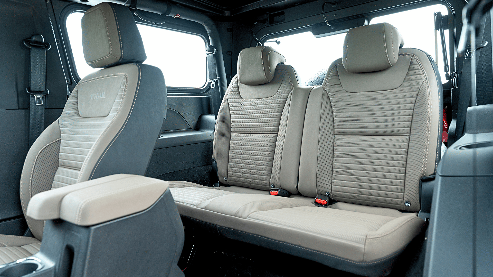 Rear passengers now get handrests and cup holders